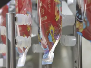 Pouch pick-up & filling section