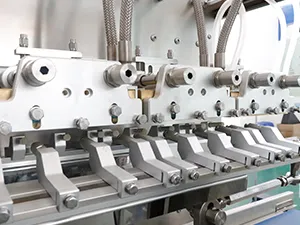 Pouch grippers, HMI control panel, liquid product tank, conveyor system