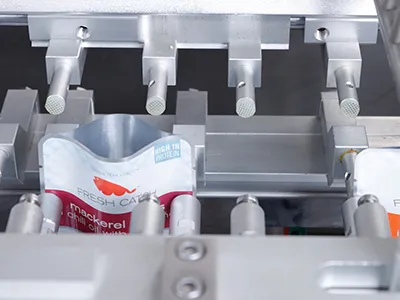 Gripper system, product hopper, conveyor system, filling unit